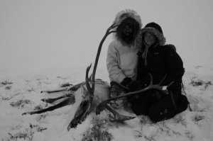 Zandra and Mike with their years supply (and our expeditions supply!) of subsistence harvest wild meat